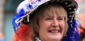 London, United Kingdom - January 01, 2012: A Pearly Queen taking part in the New Year\'s Day procession on The Mall, central London. The Pearly Kings and Queens are a charity organisation associated with working class culture in London."